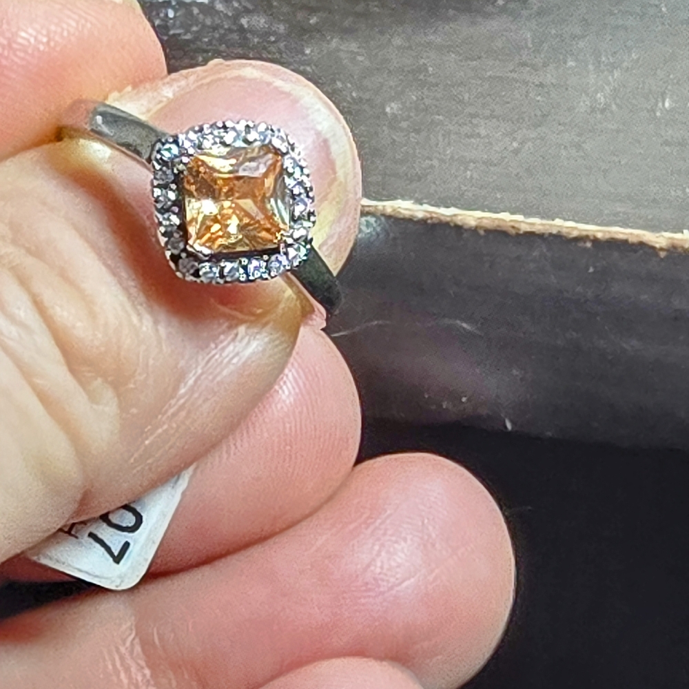 Radiant Gold and Silver Ring with Sparkling Centerpiece